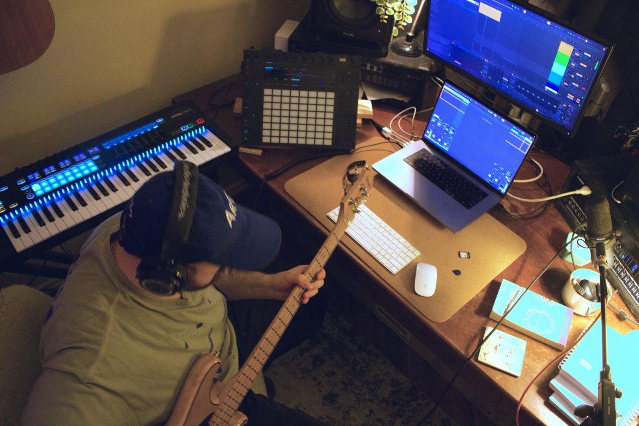overhead shot of me at my desk playing bass